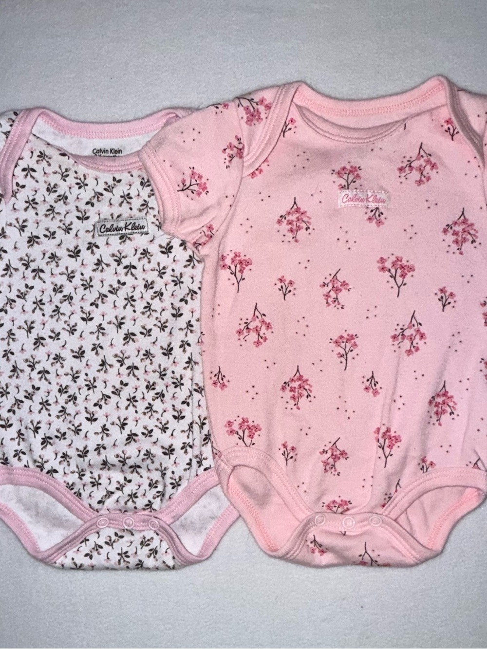 Lot of 2 Calvin Klein Baby Girls' Pink Floral One-Piece Bodysuit size 3 - 6 mth